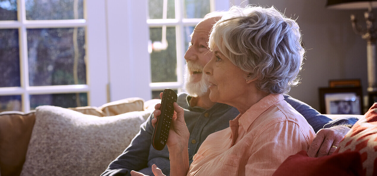 Voice Remote_Tb Older women using the dish voice remote